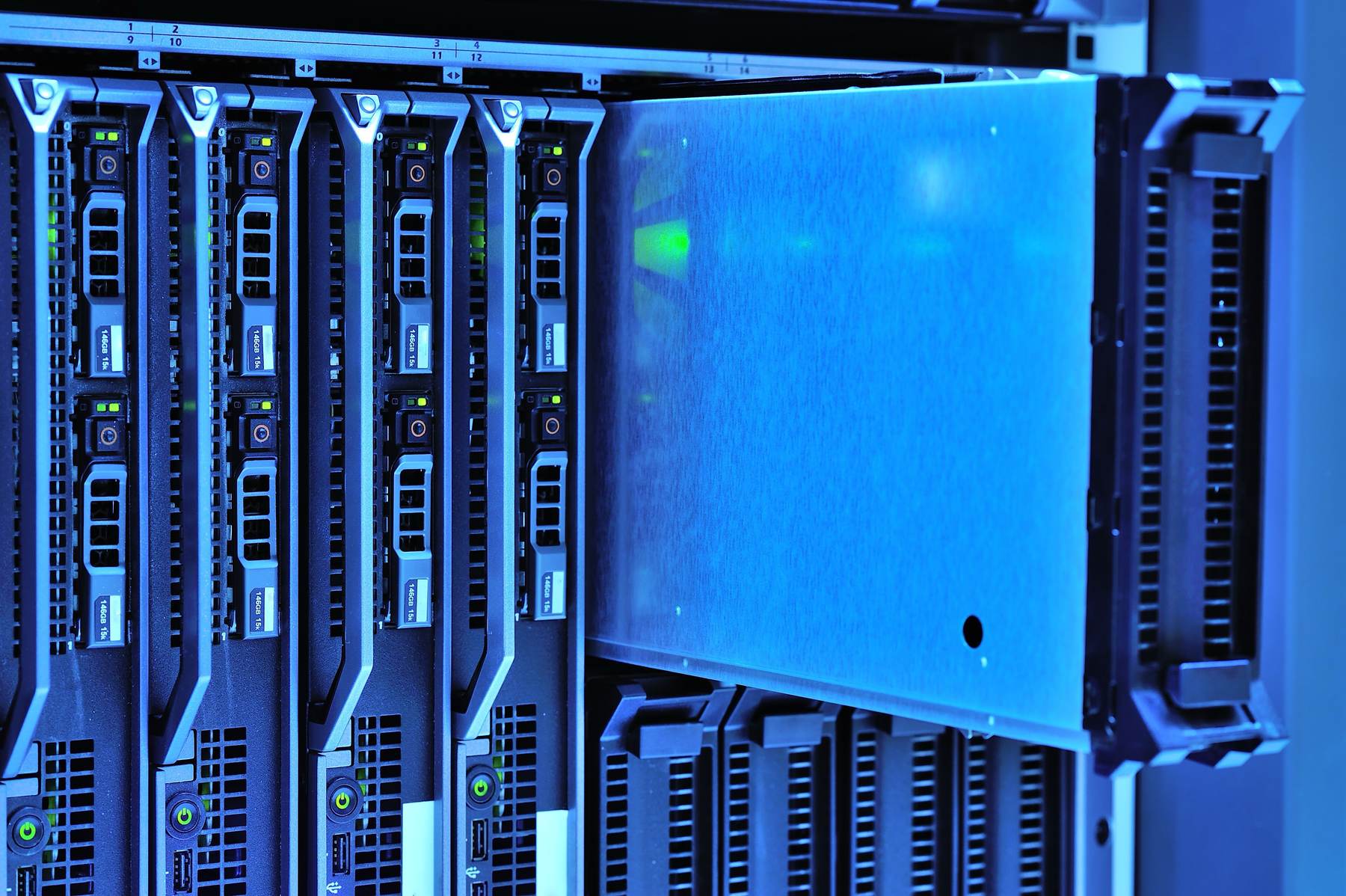 A systems room filled with racked electronic equipment